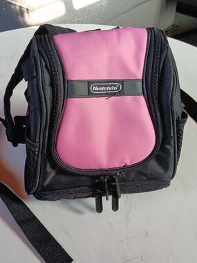 Nintendo DS Backpack Carrying Case in Pink and Black is an authentic Nintendo
